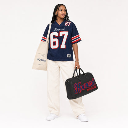 Howard Legacy Campus Collection female campaign model wearing Howard jersey with travel bag and tote