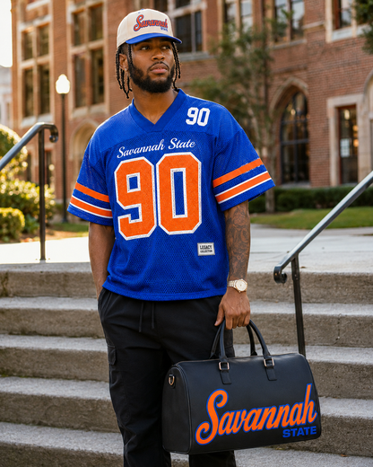 Savannah State Tigers 90 jersey campus lifestyle with Legacy cap and travel bag