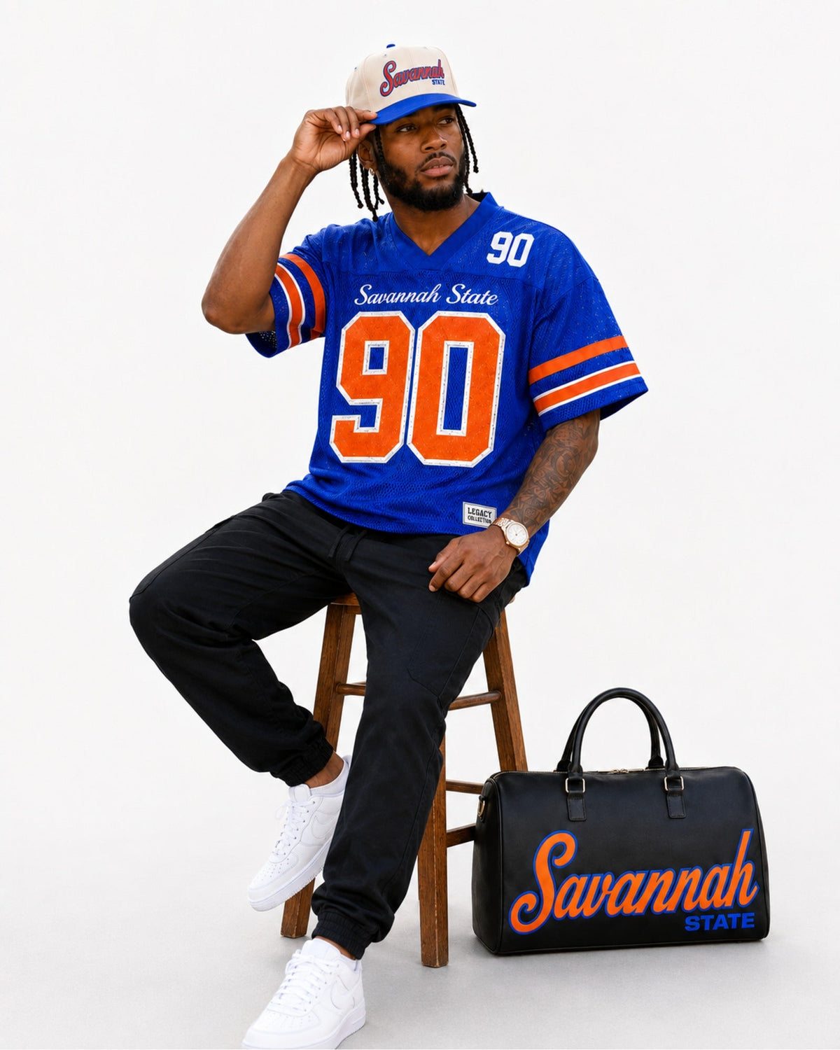 Savannah State travel bag seated studio view